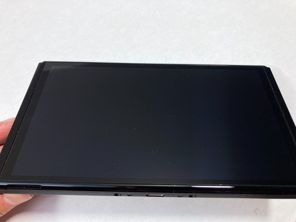 Nintendo Switch OLED Model HEG-001 Handheld Console Only Good Condition