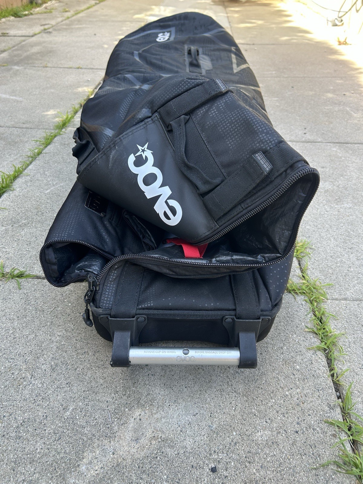 EVOC Bike Transport Bag Black Nylon with Wheels, Carry Handle, Zip Closure