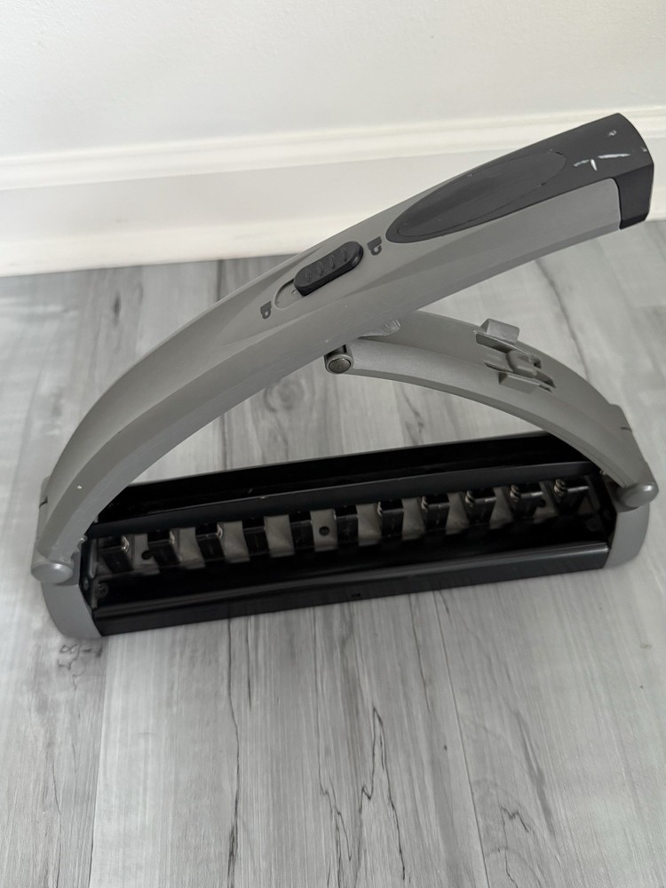 Staples Arc System Adjustable 11 Hole Punch