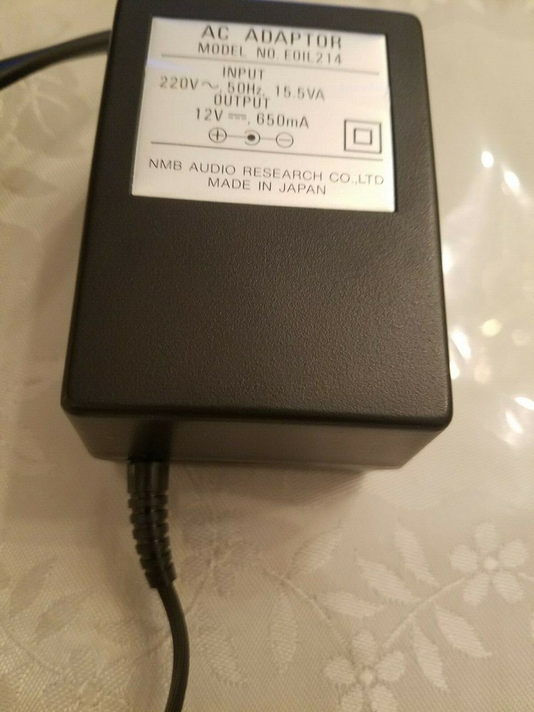 AC ADAPTOR MODEL NO. EOIL 214