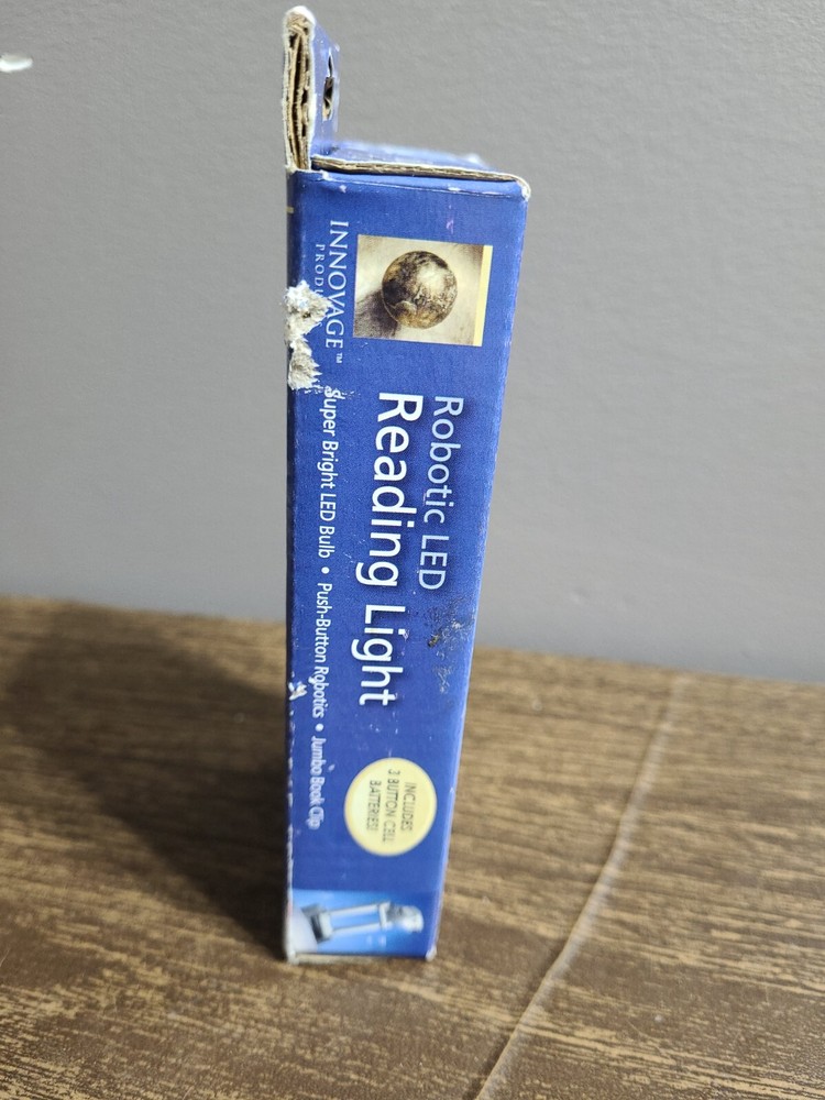 Robotic Led Reading Light Includes 3 Button Cell Batteries.