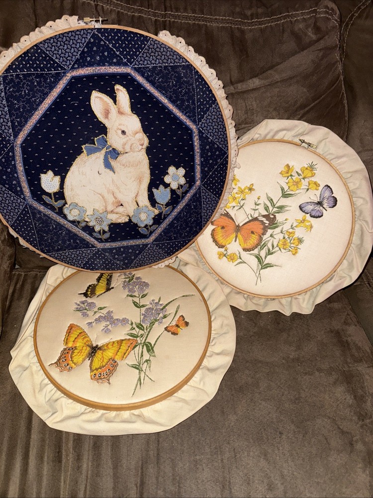 Three Embroidery Hoops With Finished Pieces