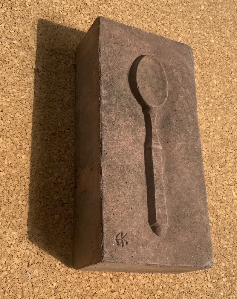 paving brick with spoon