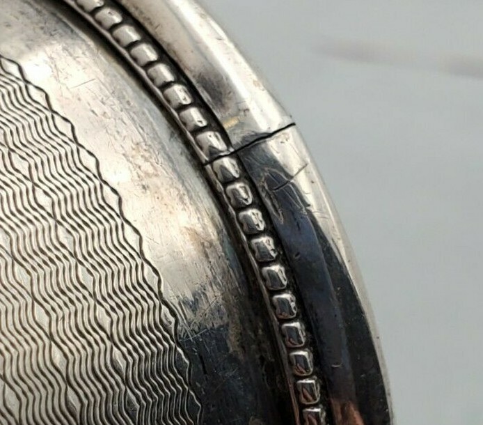 Sterling Silver napkin ring, Engine turned , Flowers, Mono