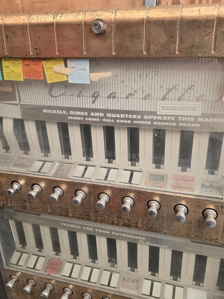Antique cigarette vending machine