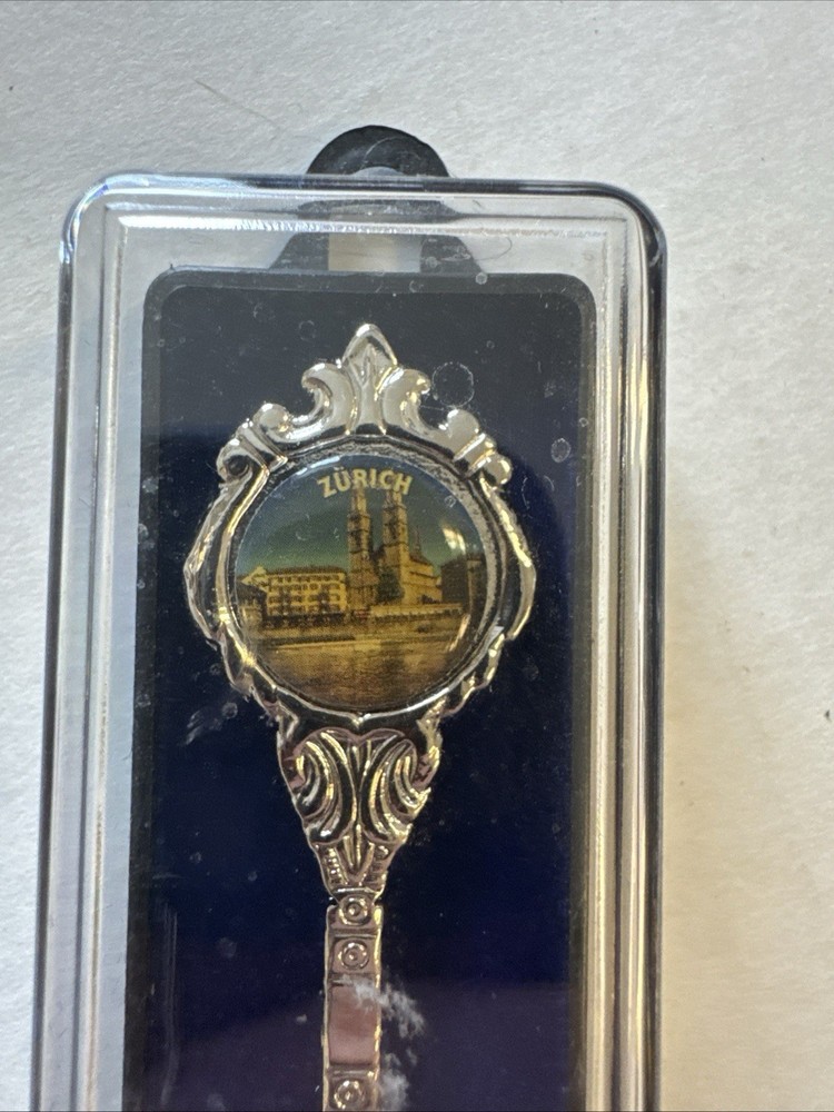 Two Souvenir Spoons From Switzerland
