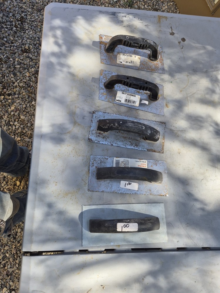 Masonry Tools And Notched Towels