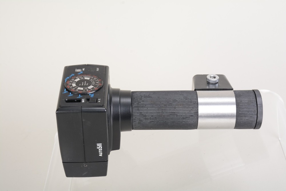 Sunpak Auto 511 Handle Mount Flash w/ Bracket. Fair condition. Tested Good 498