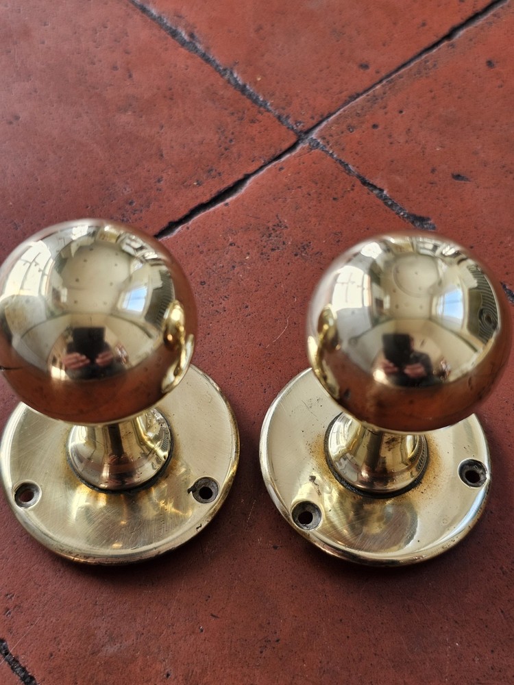Antique original brass door knobs