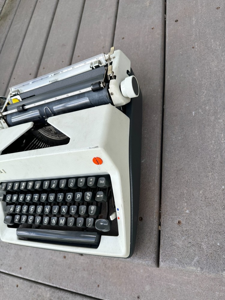 Olympia SM9 Portable Typewriter with case