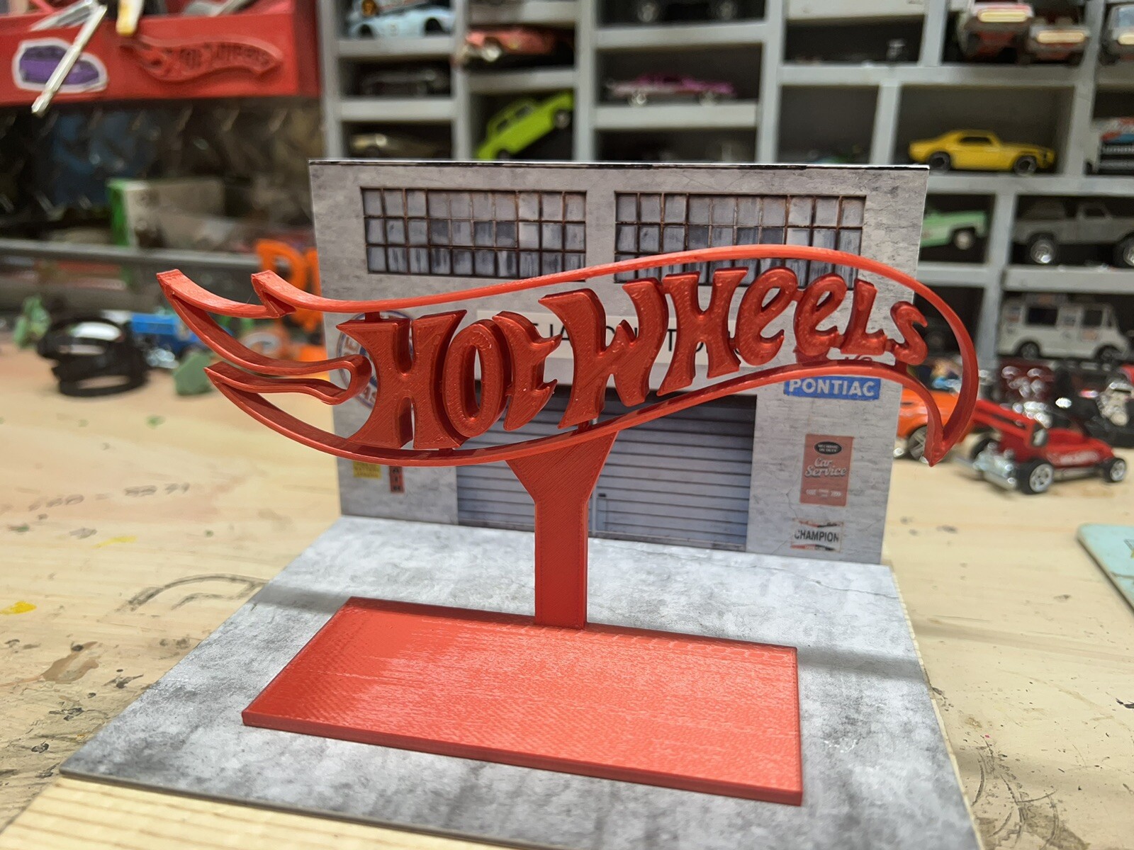 red hotwheels stand