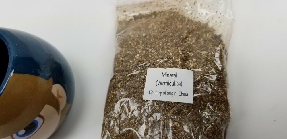 Nella Garret Grass Head