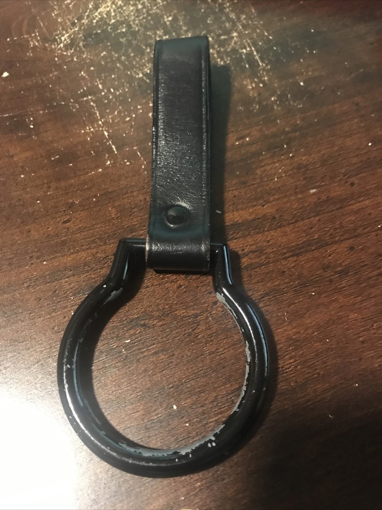 Flashlight holder for belts