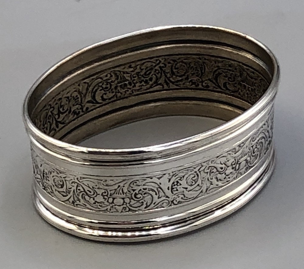 Webster Sterling Silver Napkin Ring marked with pretty engraved pattern