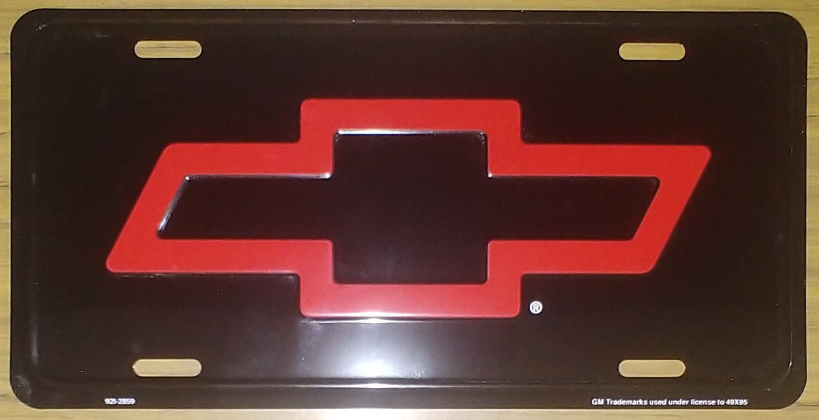 Vintage Chevy License Plate Red Bowtie Bow-Tie Embossed Auto Tag Metal Old Stock