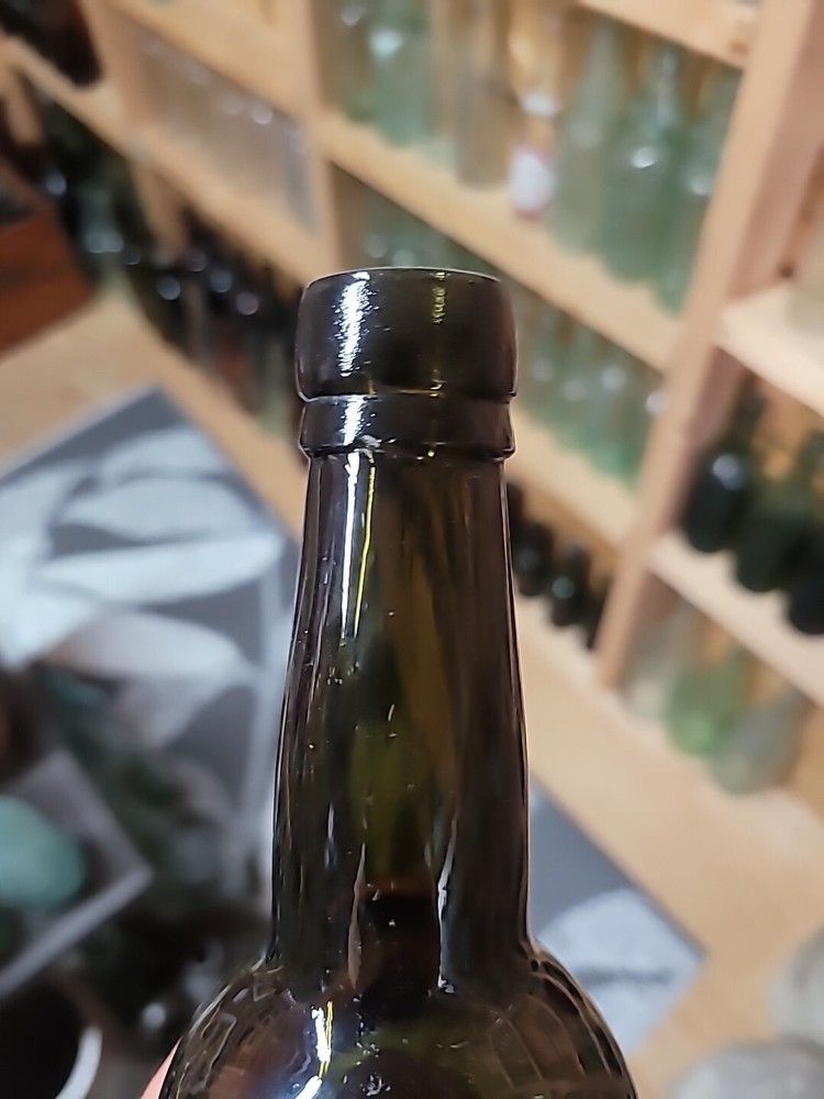 Early Wine Bottle With Etching