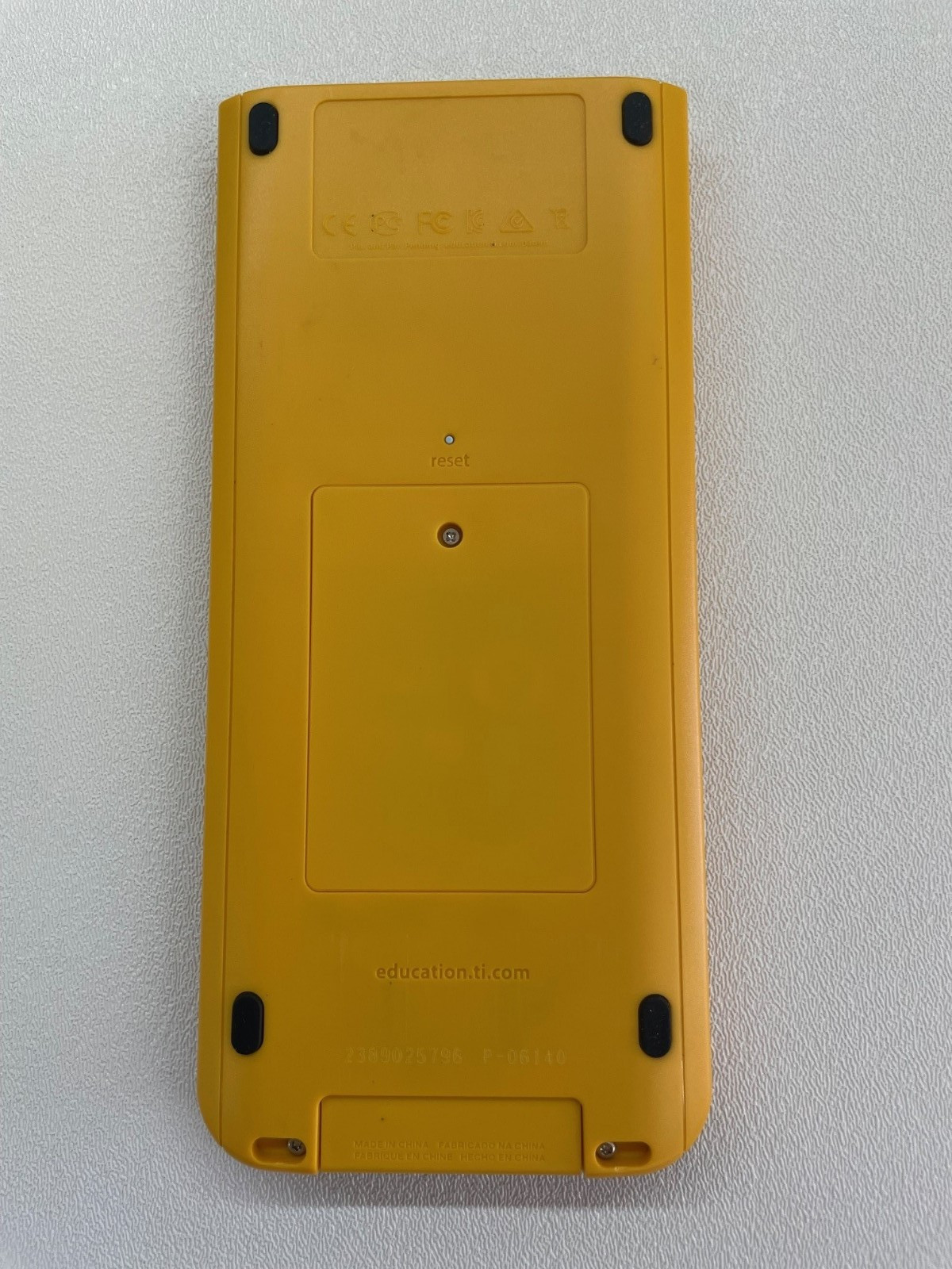 TI Nspire CX Color-Display Graphing Calculator with School Property Markings.