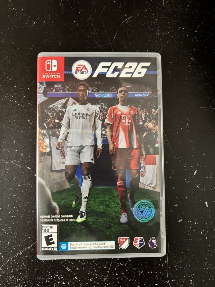 Nintendo Switch OLED Bundle with Joy-Con Controllers, Controller Grip, FC26 Game