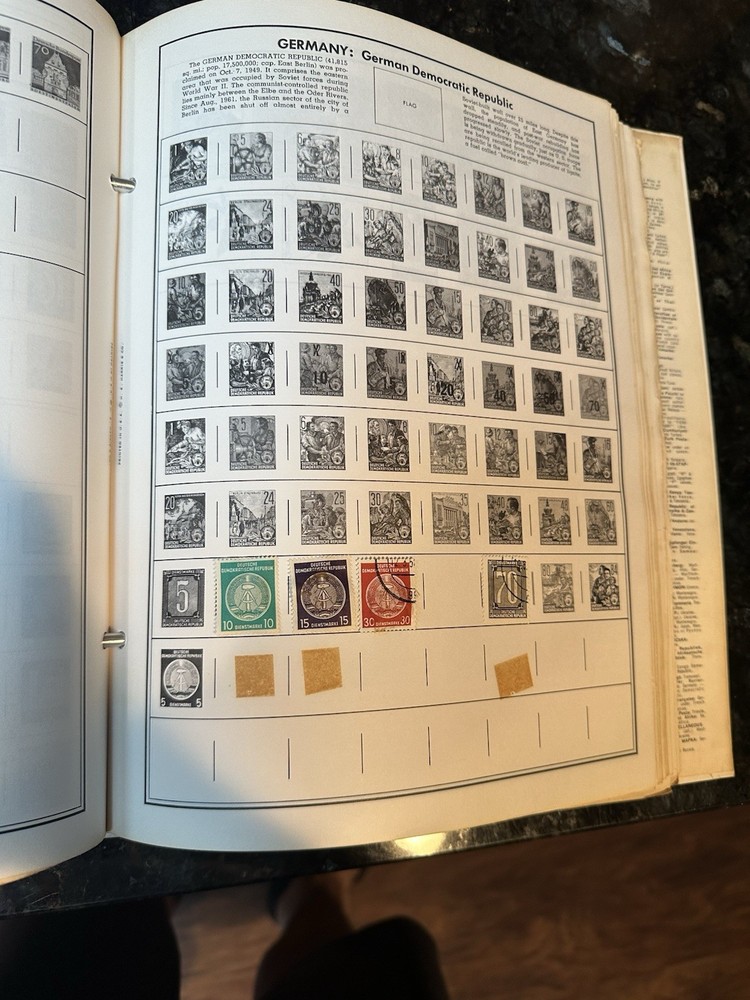 VTG 1977 Traveler Stamp Album With Many Stamps.