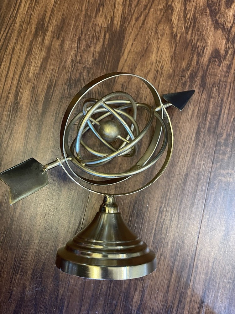 8” tall Decorative Bronze Colored Spinning Arrow Globe