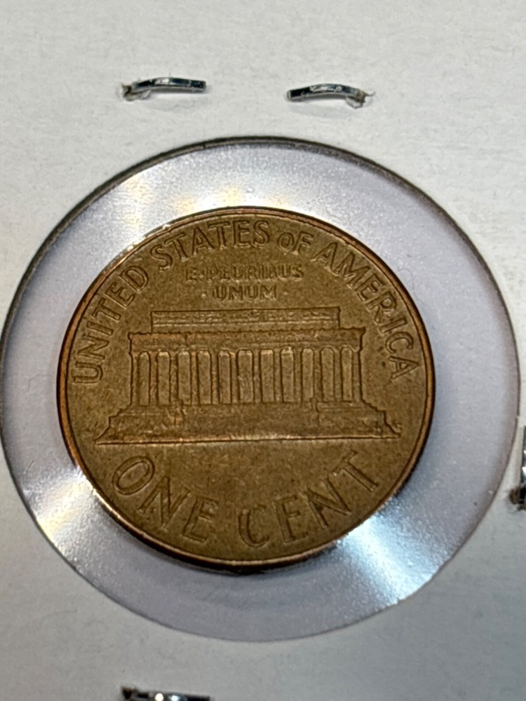 1964 D Lincoln Cent Lamination Die Cud by “L” (BROKEN L ERROR)