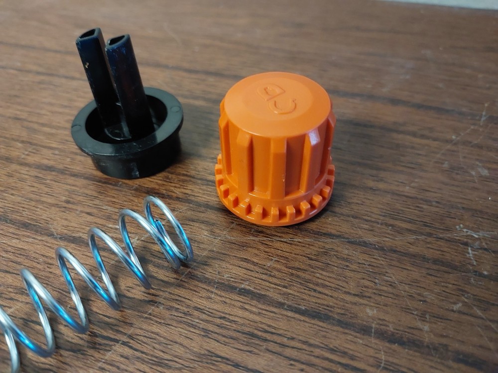 BLACK+DECKER LST140 40V String Trimmer - Replacment Handle Lock Button Assembly