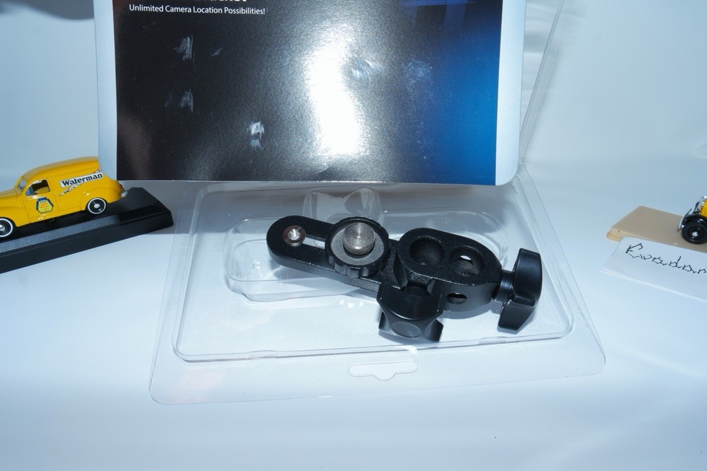 New Flashpoint rotating camera flash bracket with integrated anti twist