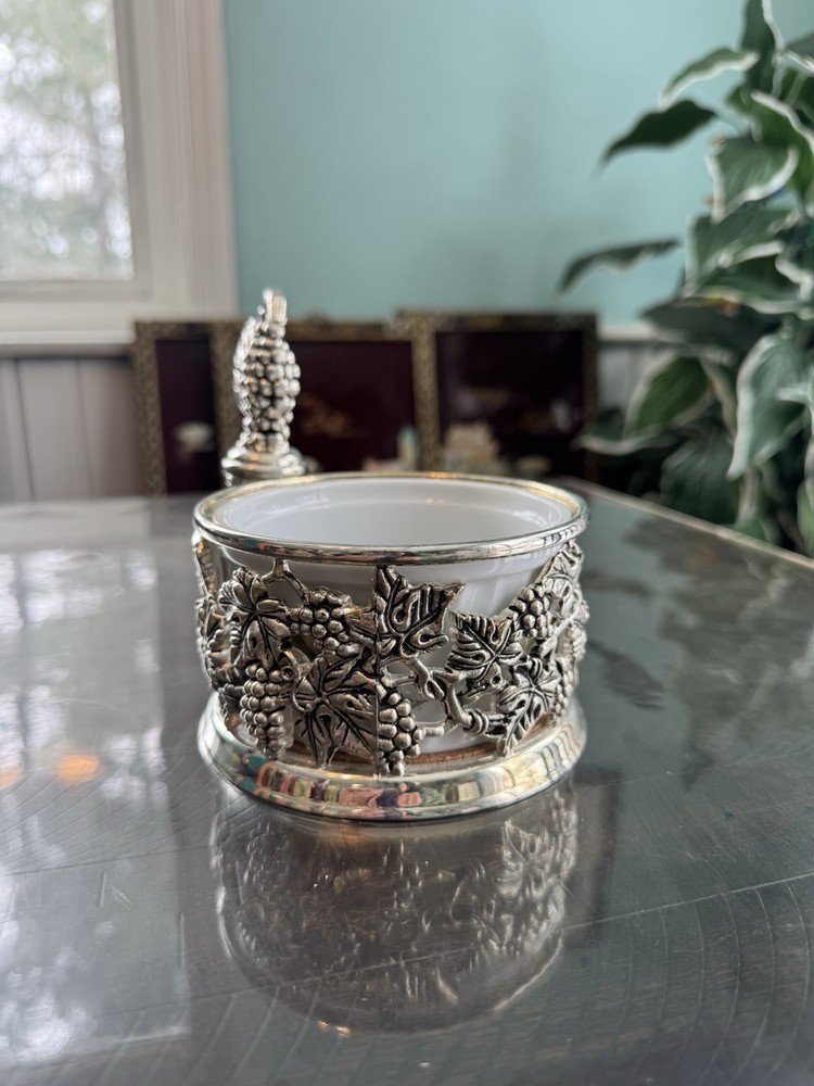 Godinger silver-plated wine bottle coaster with a grapevine design
