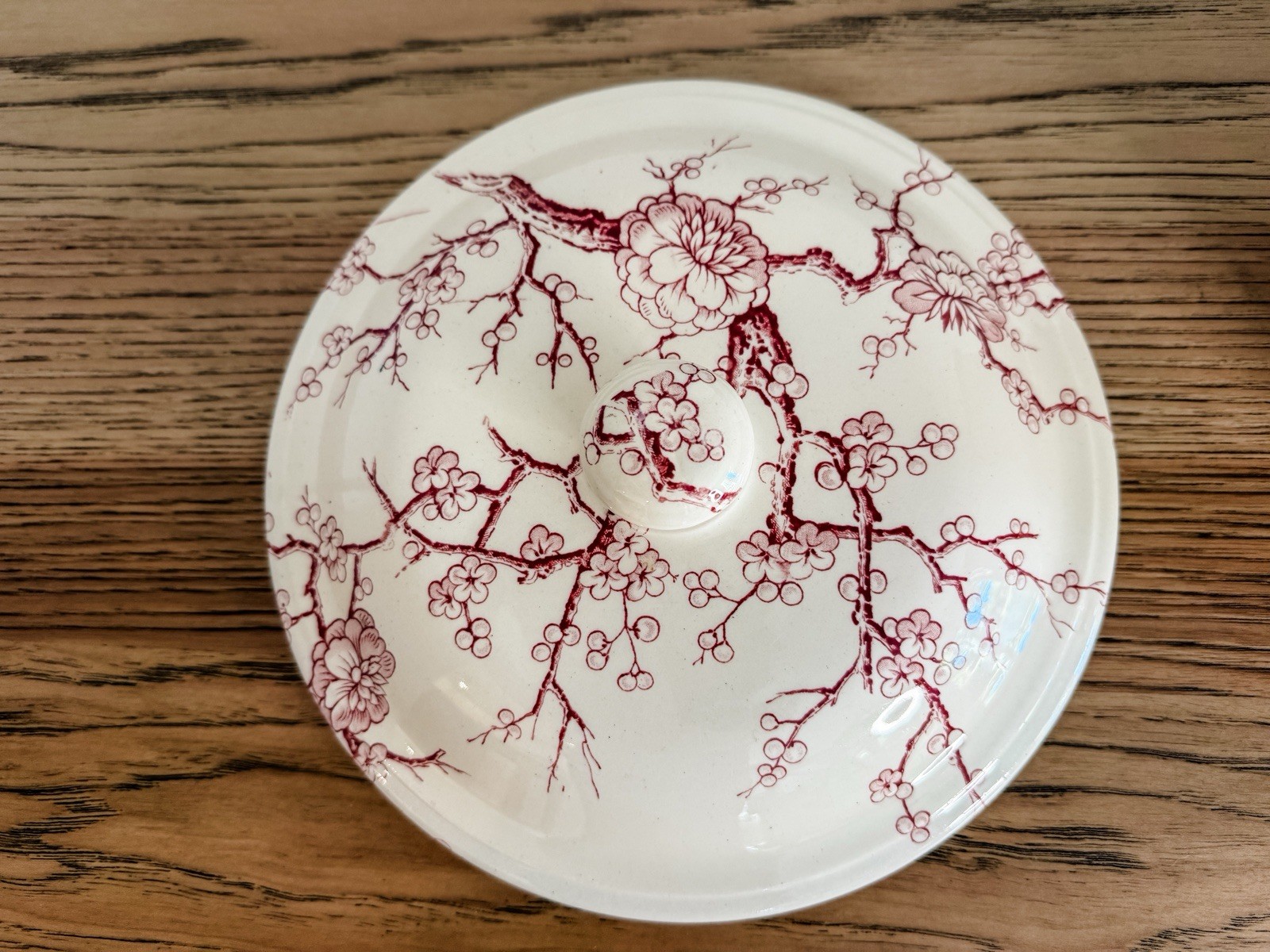 Antique Chamber Pot With A Red Transferware Pattern