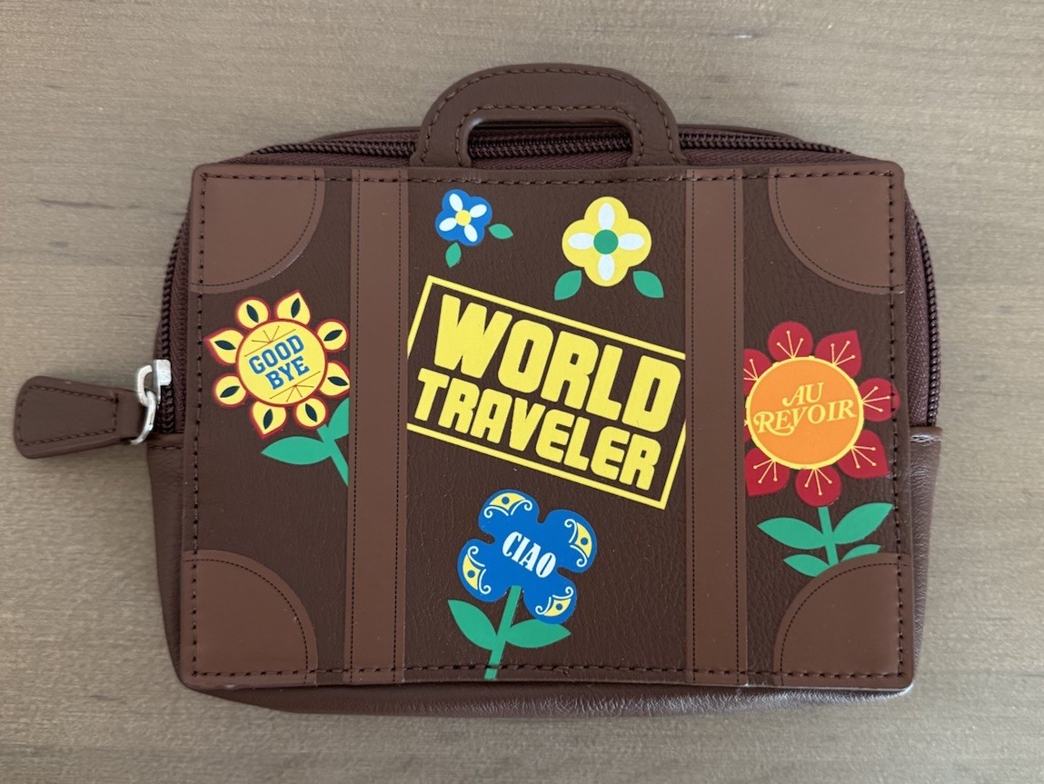 Disney Parks “ It’s A Small World” Traveler Clutch