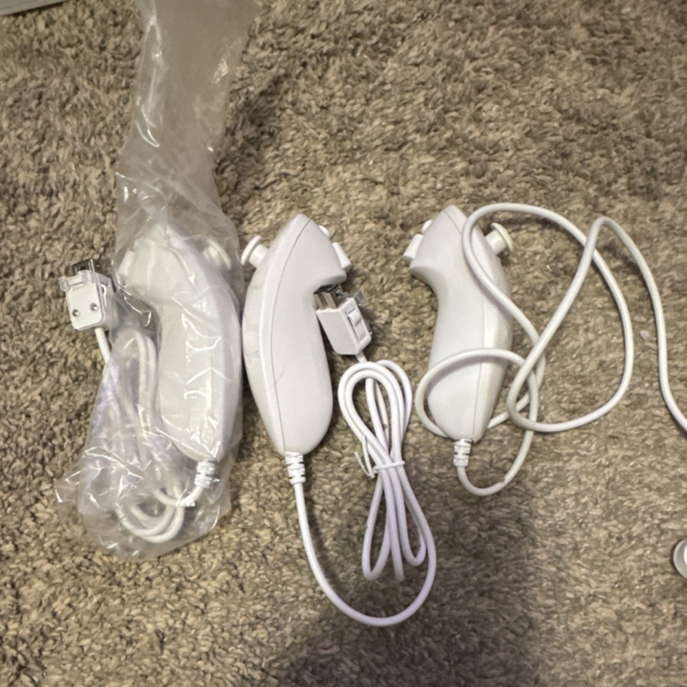 Nintendo Wii Console Bundle with Remotes, Nunchuks, Sensor Bar, AV Cables