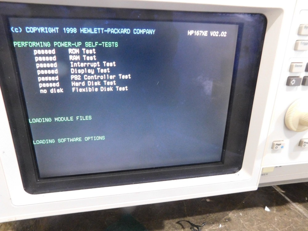 Hewlett Packard Model: 1670E Logic Analyzer with Accessories Pictured