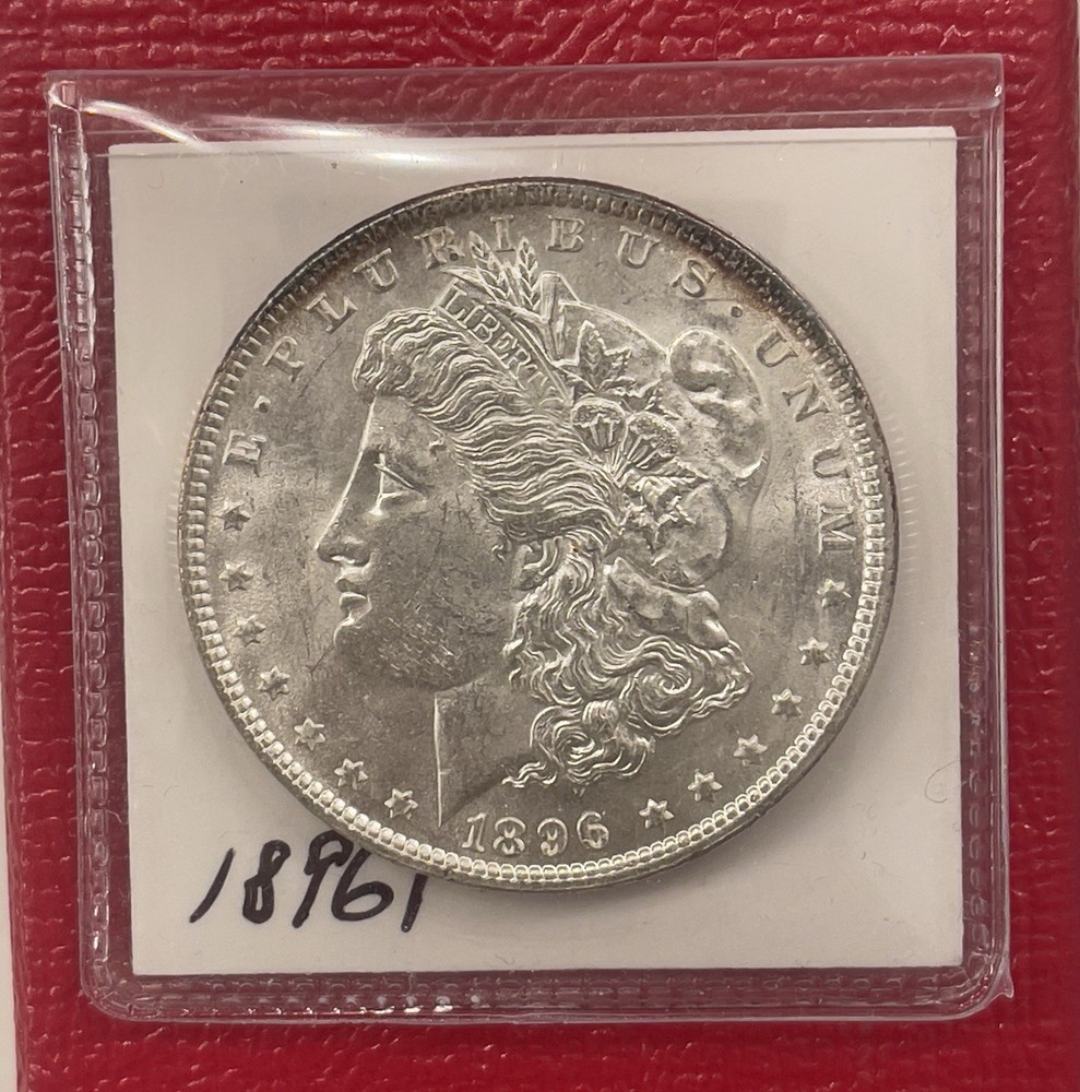 1896 P Morgan Silver Dollar, Choice to Gem Uncirculated.