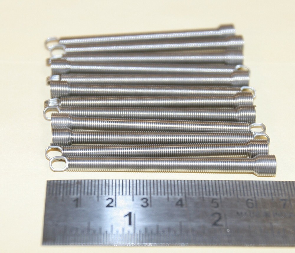 ESD coin chute return spring replacements - 12 pack - part no. 20963