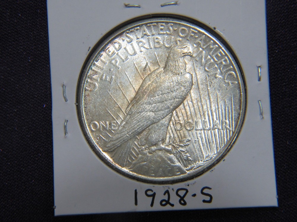 1928-S Peace dollar in A.U. / UNC condition