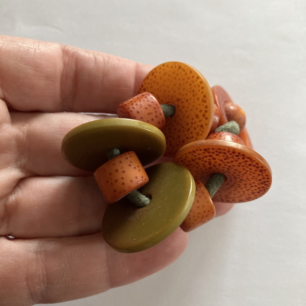 1940’s Orange Green Speckled Bakelite Ring Crib Toy Teething Ring String