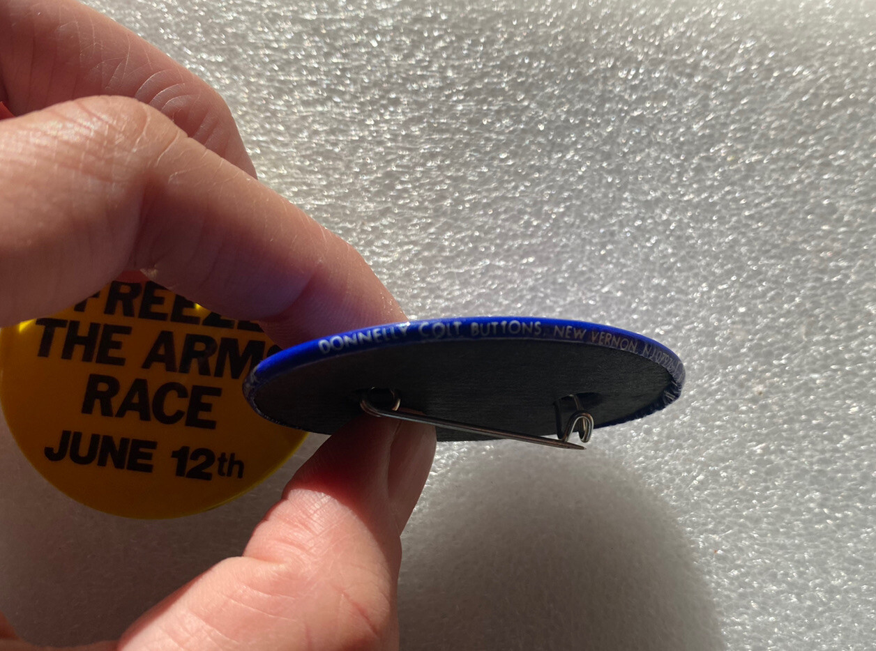 1980's Buttons March to Freeze The Arms Race June anti-nuclear war pin pinback