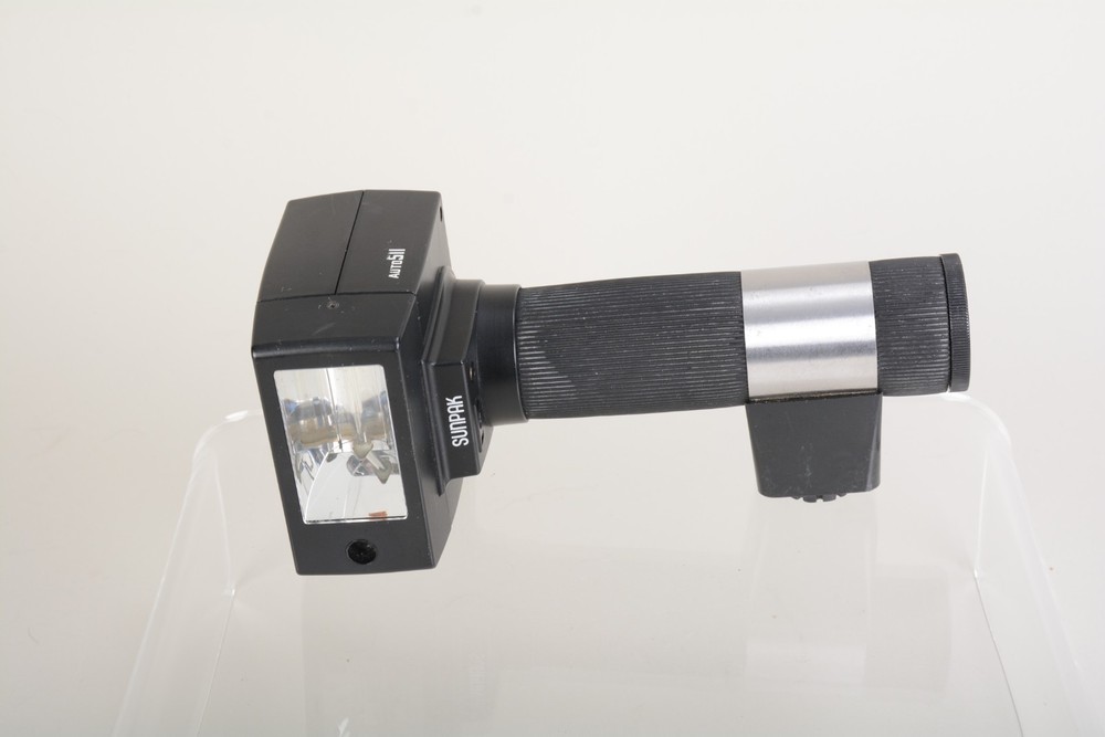 Sunpak Auto 511 Handle Mount Flash w/ Bracket. Fair condition. Tested Good 498
