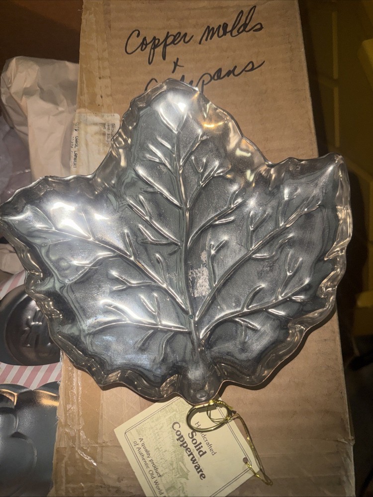 vintage handcrafted solid copper leaf-shaped dish or wall decoration.
