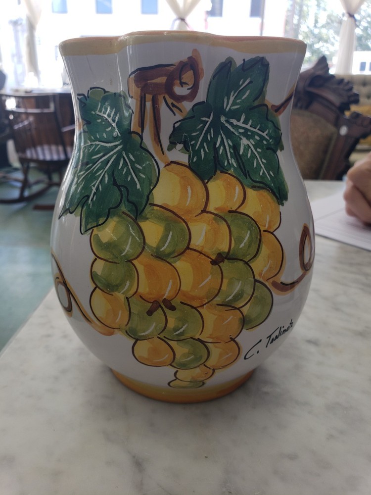 Hand painted, signed, ceramic pitcher,