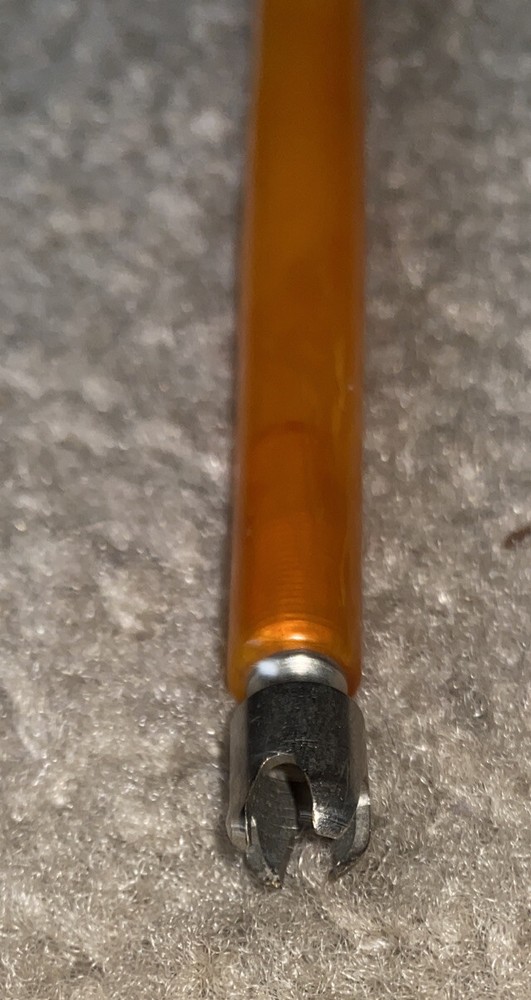 Vtg Butterscotch Bakelite handled tool?