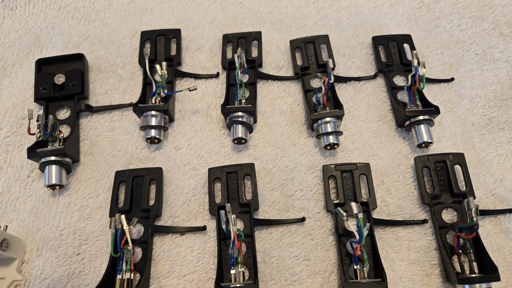 13 Turntable Headshells. 12 OEM Technics, One Pickering. Five P-Mount Adapters