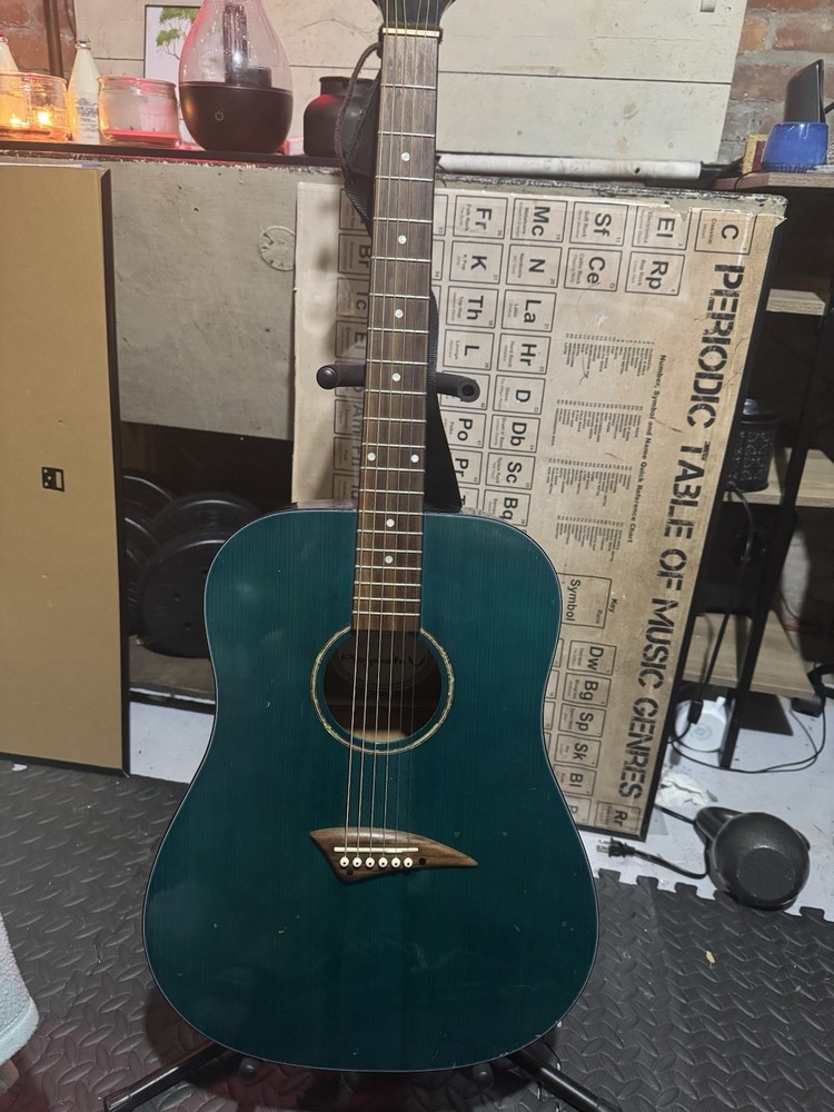 Blue-teal Playmate Guitar