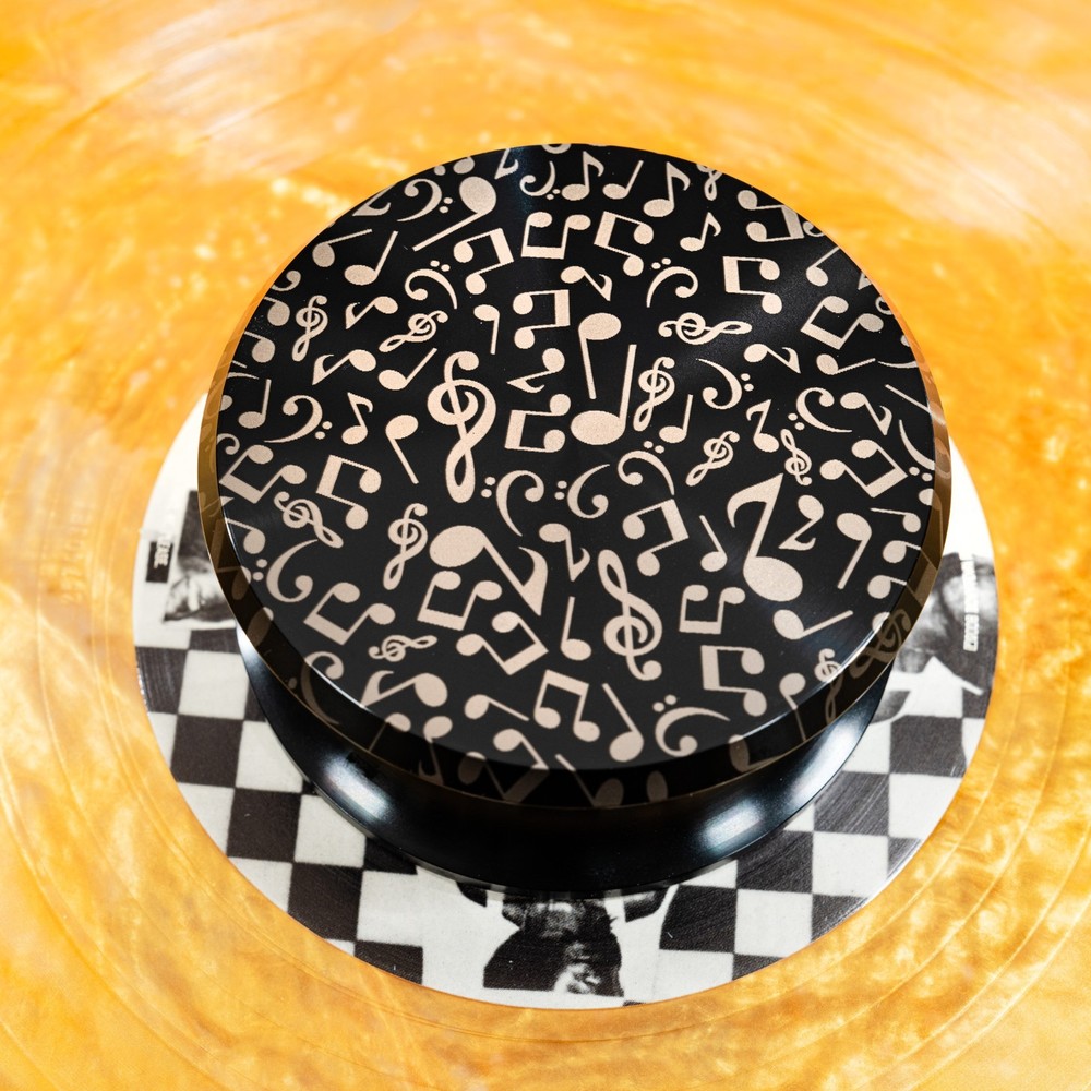 Turntable  record weight. Musical Notes engraved quality record stabilizer.