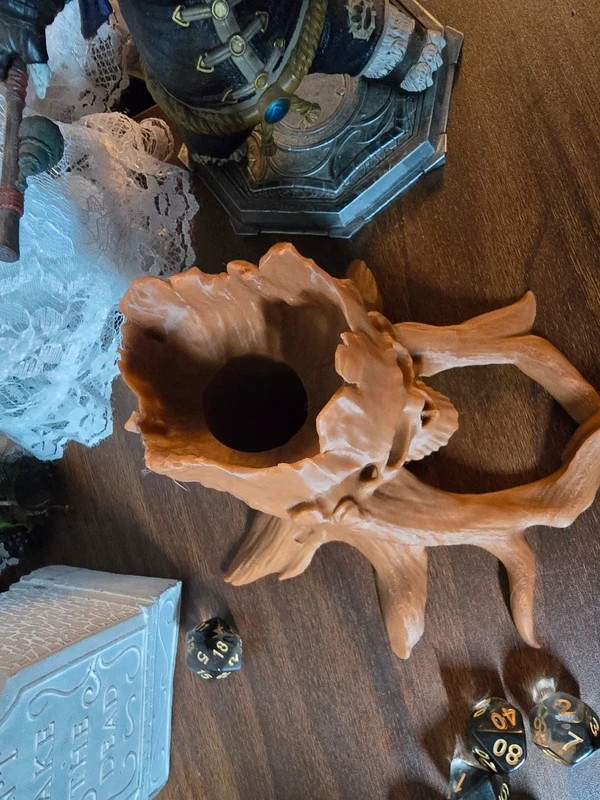 A Deathly skull tree stump novelty dice tower D&D