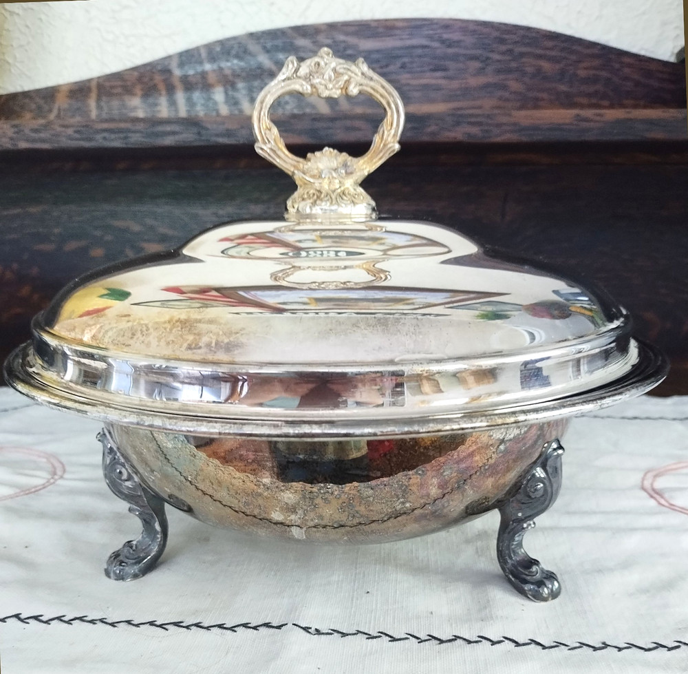 Covered footed silver-plated serving dish with lid 10 ¼” across