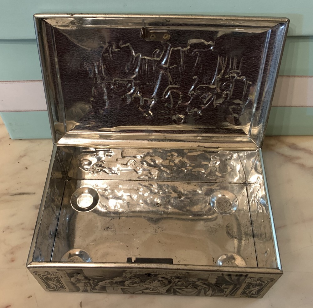 VINTAGE RUBENS EMBOSSED TIN BOX KEYLESS BOX