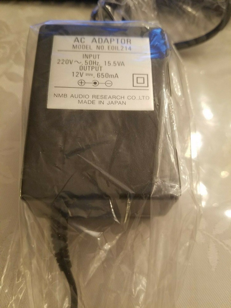 AC  ADAPTOR   MODEL NO. EOIL 214