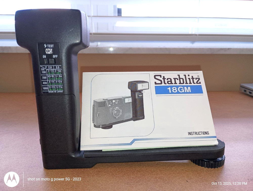 Starblitz 18GM electronic slave flash/camera bracket combo