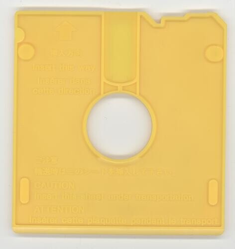 Vintage Apple Macintosh Plus - Yellow Floppy Drive Plastic Protector Disk